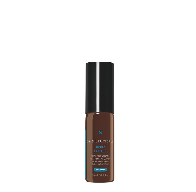 Skincare serum bottle with black cap on a white background
